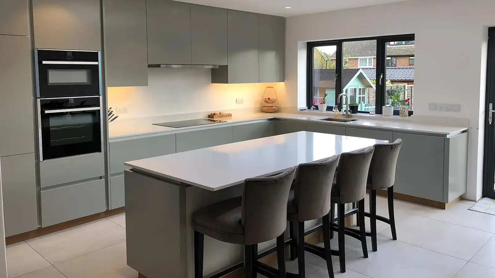Quartz worktops with breakfast bar island installation in Hoddesdon