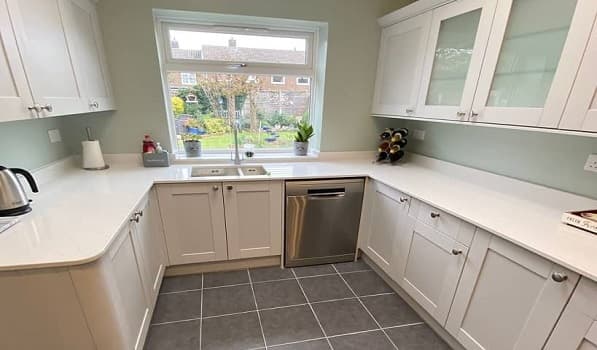 Lightly veined quartz worktop installed in Harlow