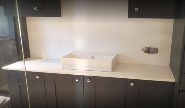 White Shimmer quartz vanity tops with surface mounted sink