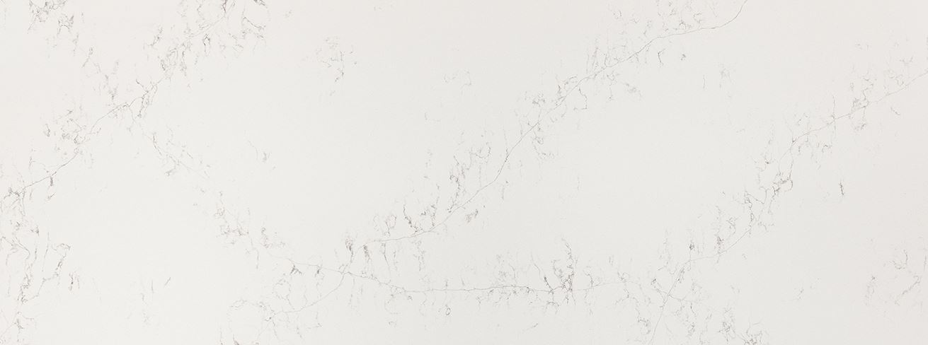 white quartz worktop with very subtle veining in a modern kitchen