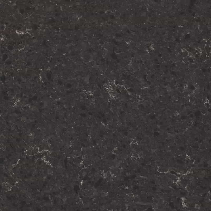 black quartz worktop with fossil textured pattern